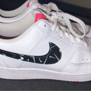 Nike White Sneakers with Black Swoosh